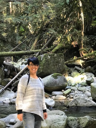 Helga standing in river